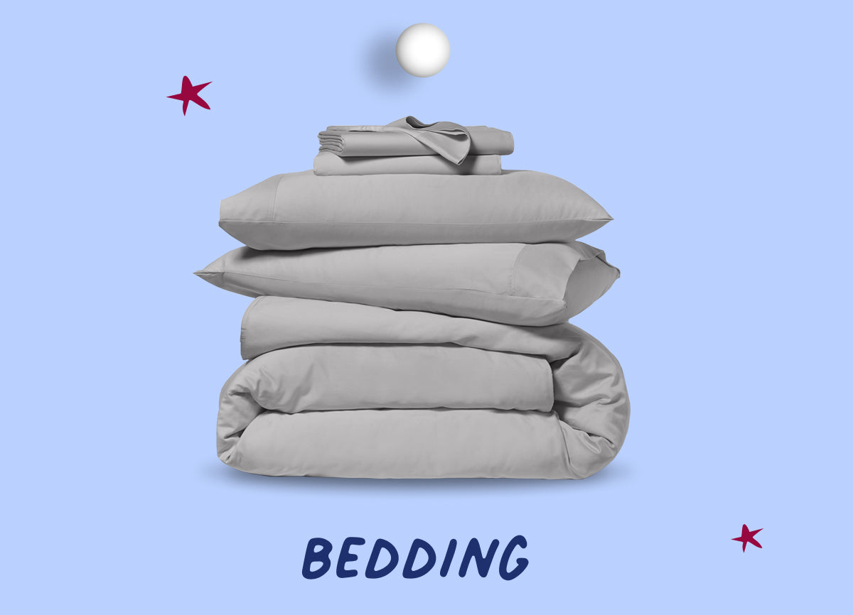 Stack of folded bedding on a light blue background with text that says, "Bedding."