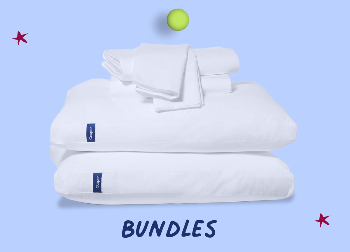White bedding set with folded blanket and pillow on a light blue background with text that says "Bundles"