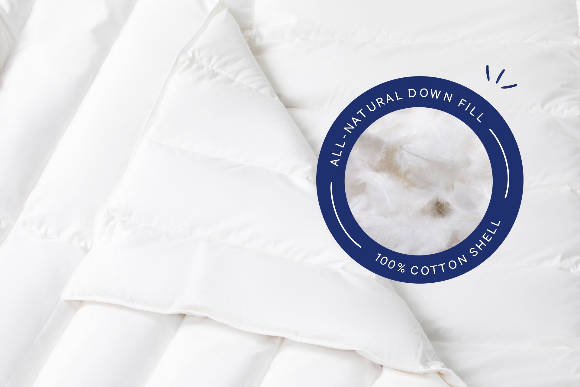 Close-up of the fill inside the Down Duvet. A badge on the image says "All-natural down fill. 100% cotton shell."