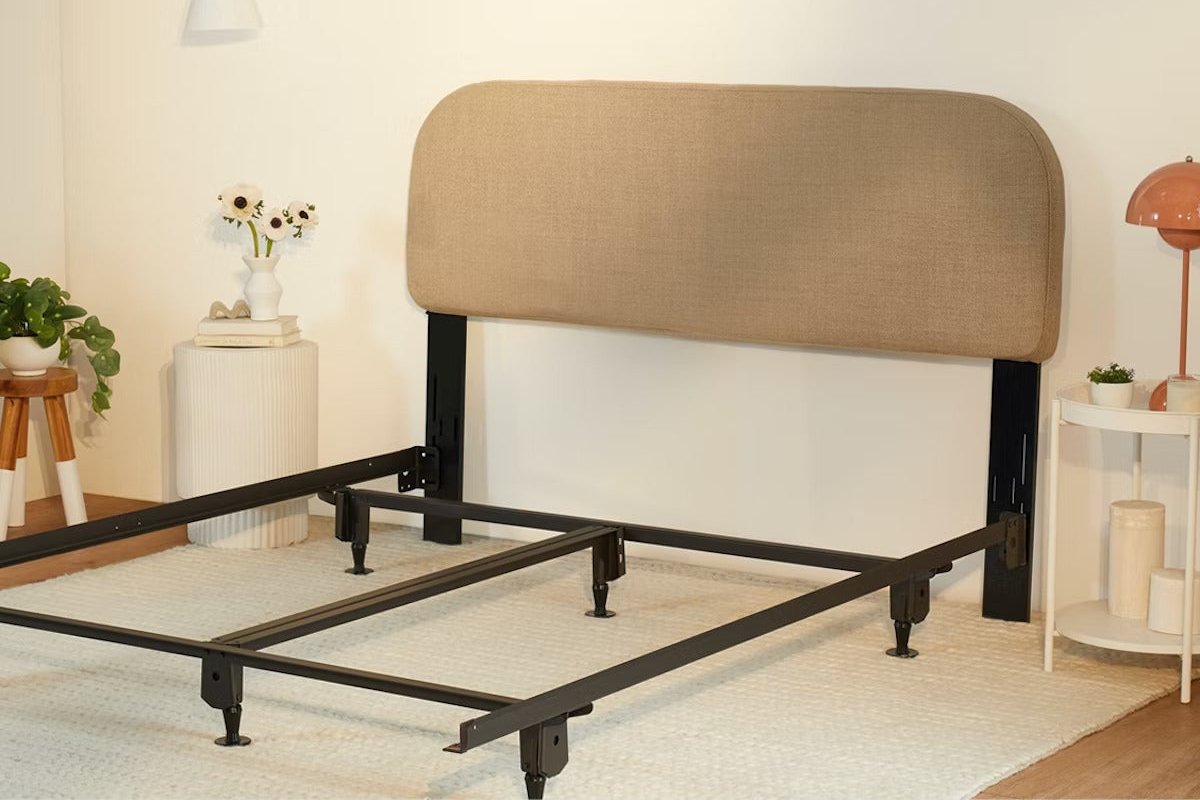 Drift Attachable Headboard, Taupe color, attached to a metal bed frame.