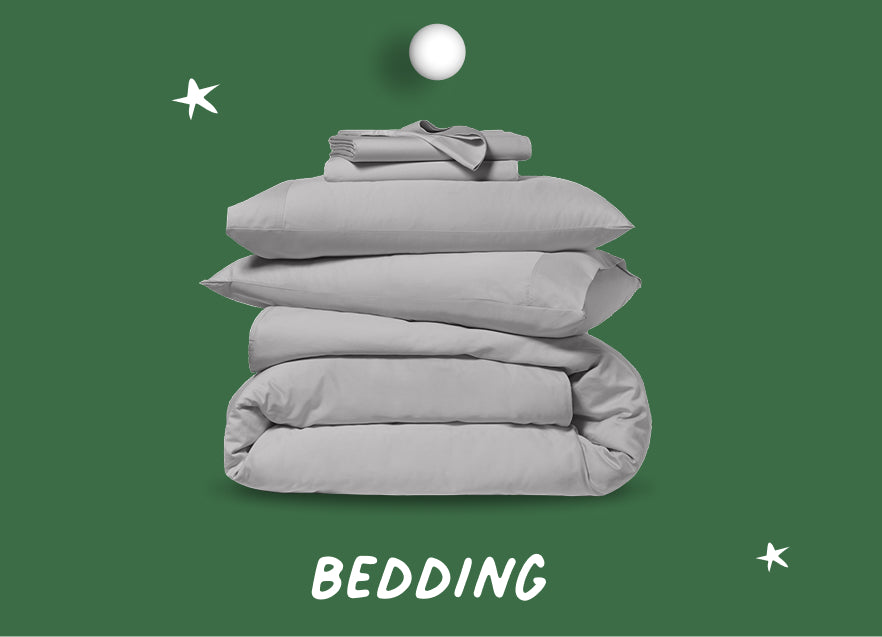 Stack of folded bedding on a green holiday background with text that says, "Bedding."