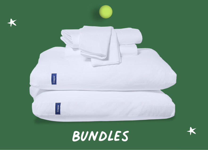 White bedding set with folded blanket and pillow on a green holiday background with text that says "Bundles"