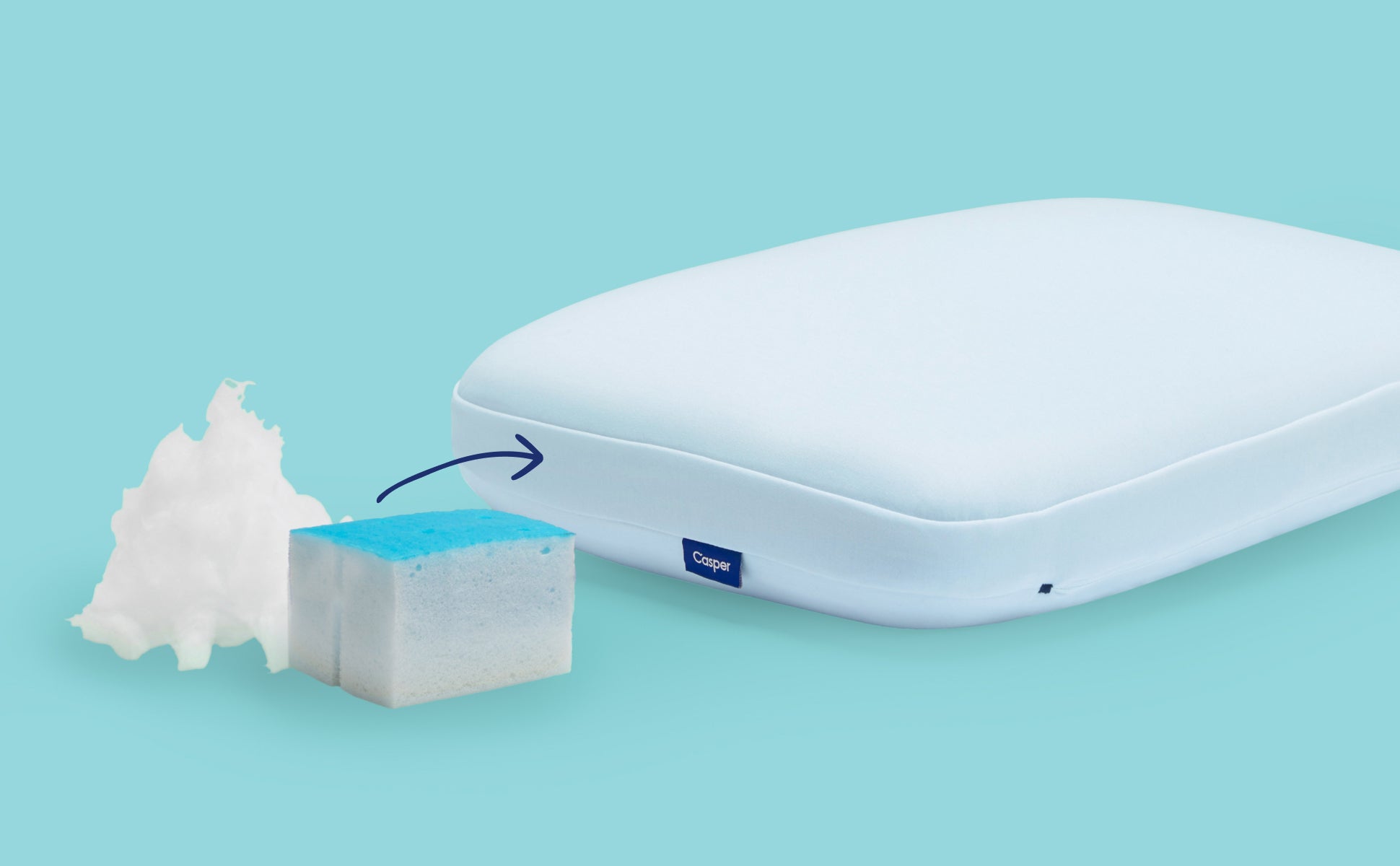 Casper's Hybrid Snow Pillow. A portion of the inner foam and fibers used in the pillow are pictured next to it.