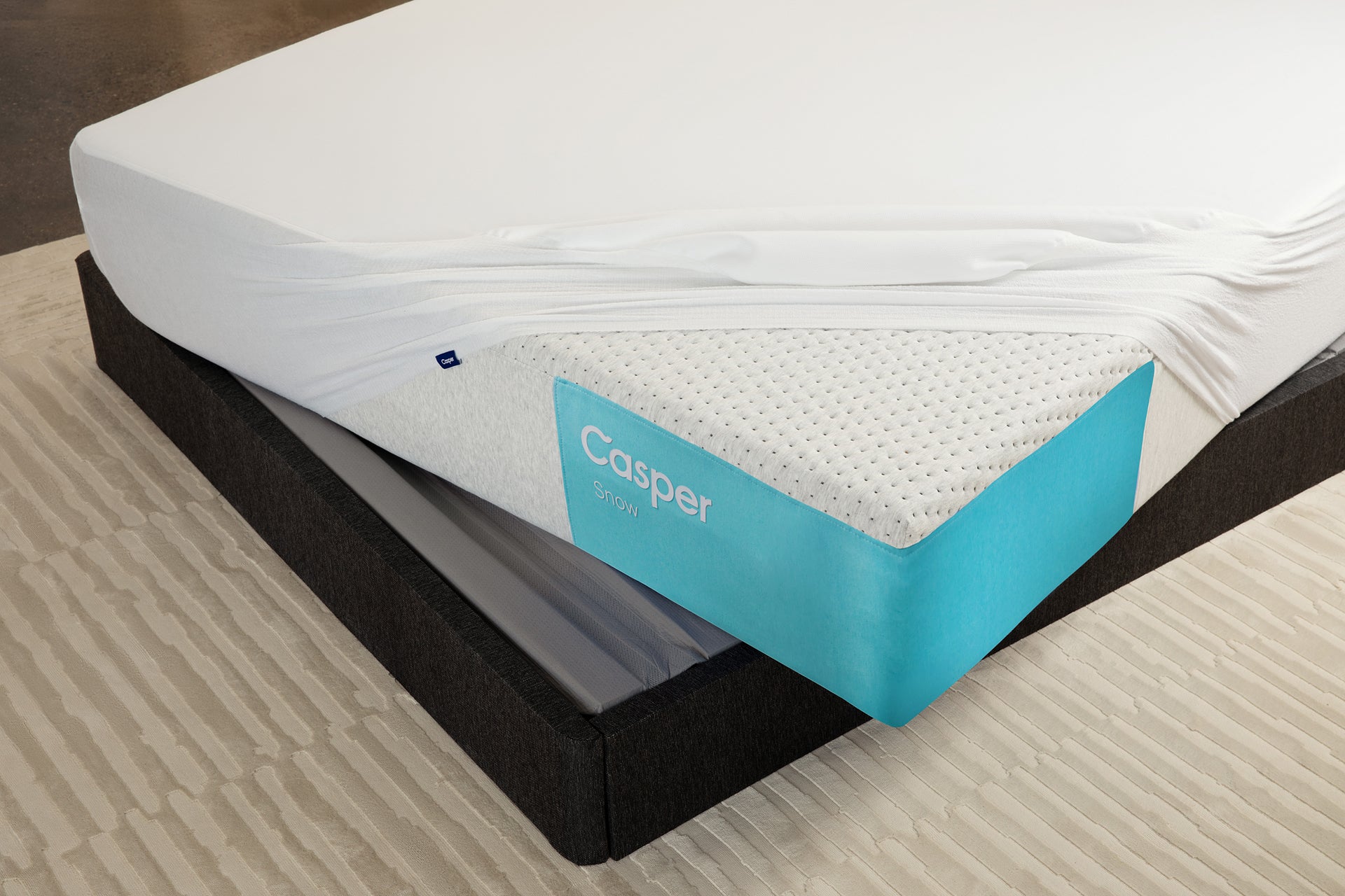 mattress protector on Casper's Snow mattress on a Foundation