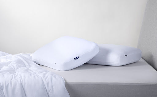 Two mwmory foam pillows on the bed