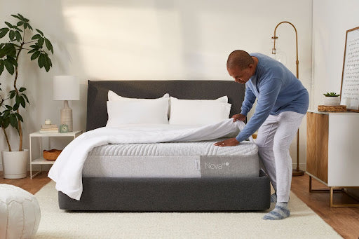 Man making bed