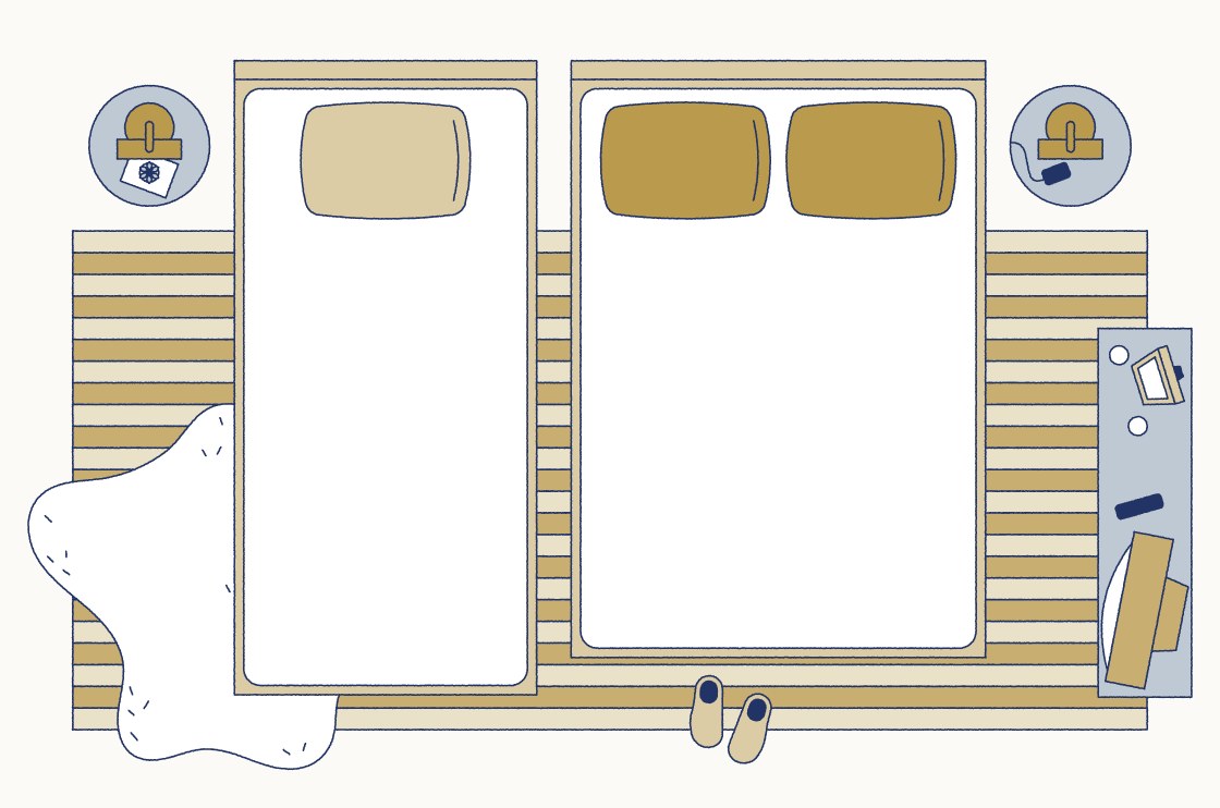 Illustration comparing two bed sizes, showing a Twin XL on the left and full size bed with two pillows on the right, viewed from above.