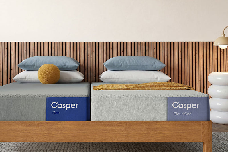 Two Casper mattresses, the One and Cloud One, on a wooden, split king-sized bed frame