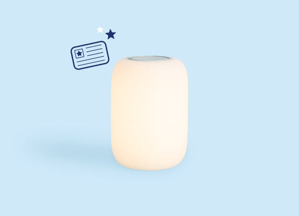 Photograph of the Casper Glow Light against a light blue background.