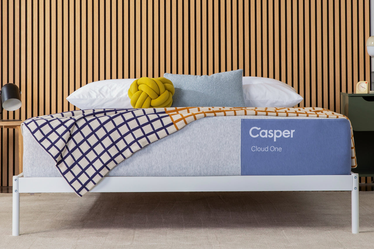 Front-view image of the Casper Cloud One mattress on a bed frame.