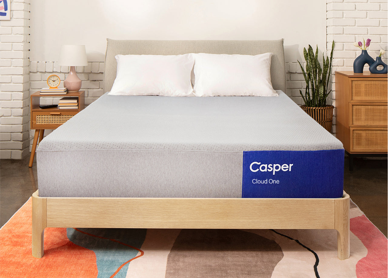 Front-view image of the Casper Cloud One mattress on a bed frame.