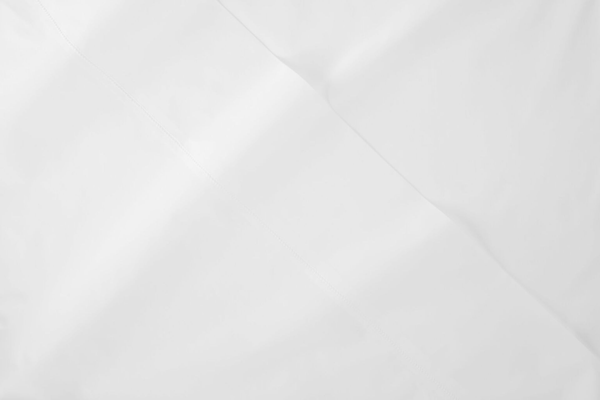 Close-up of the fabric of a Percale sheet, white