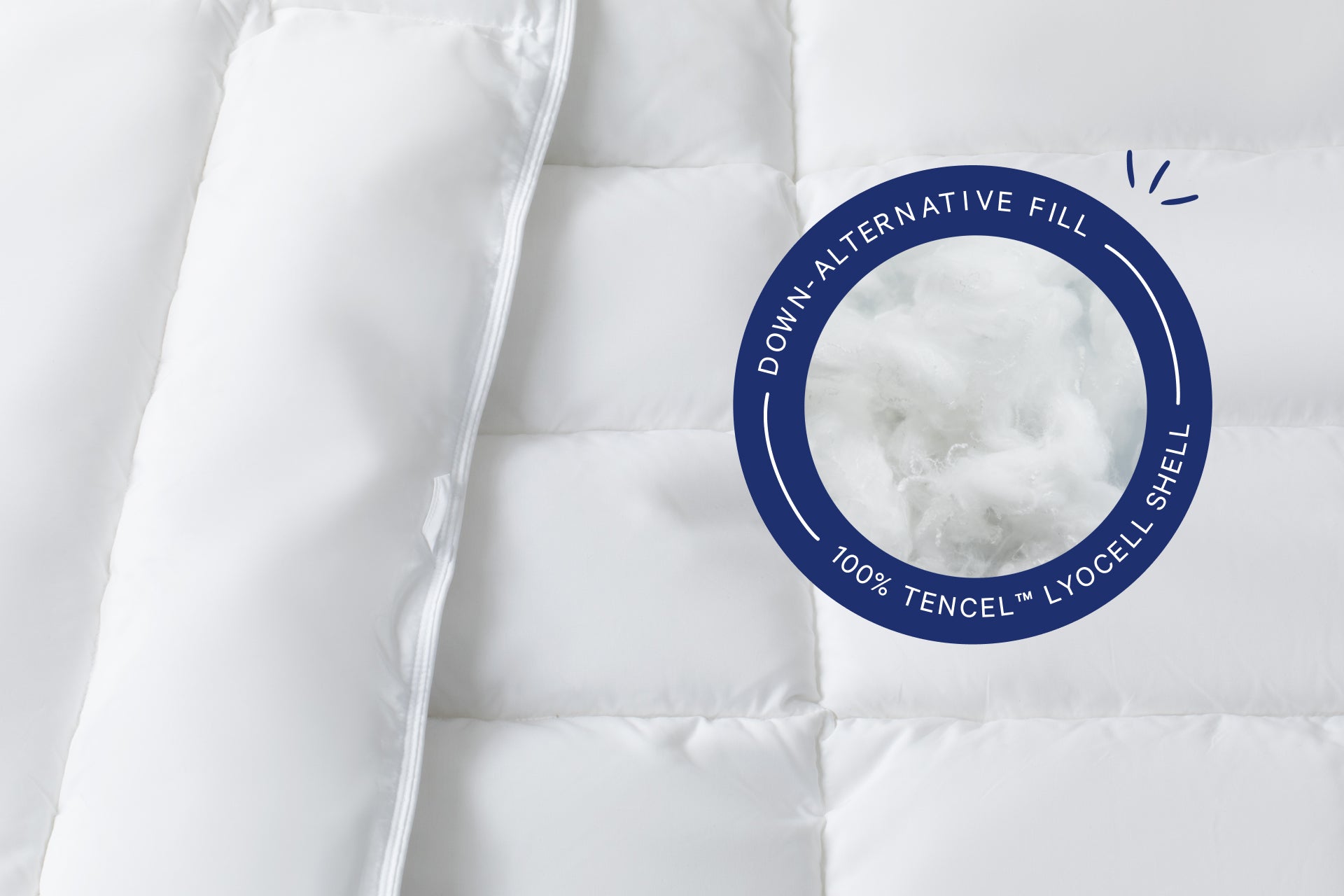 Close-up of the fill inside the Down Alt Duvet. A badge on the image says "Down-Alternative Fill. 100% Tencel™ Lyocell Shell"