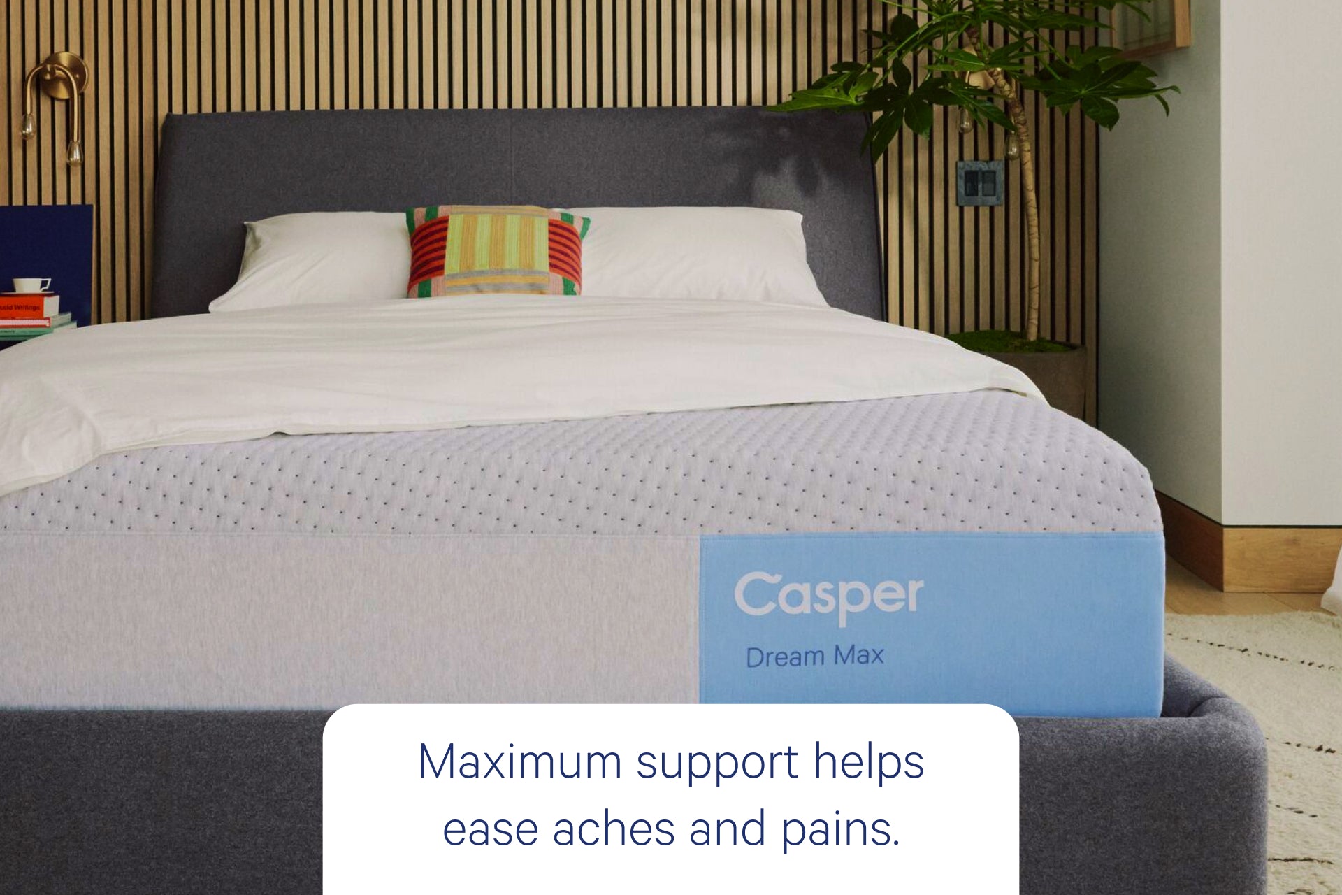 Front view of Casper's Dream Max mattress. Text at the bottom says 'Maximum support helps ease aches and pains.'