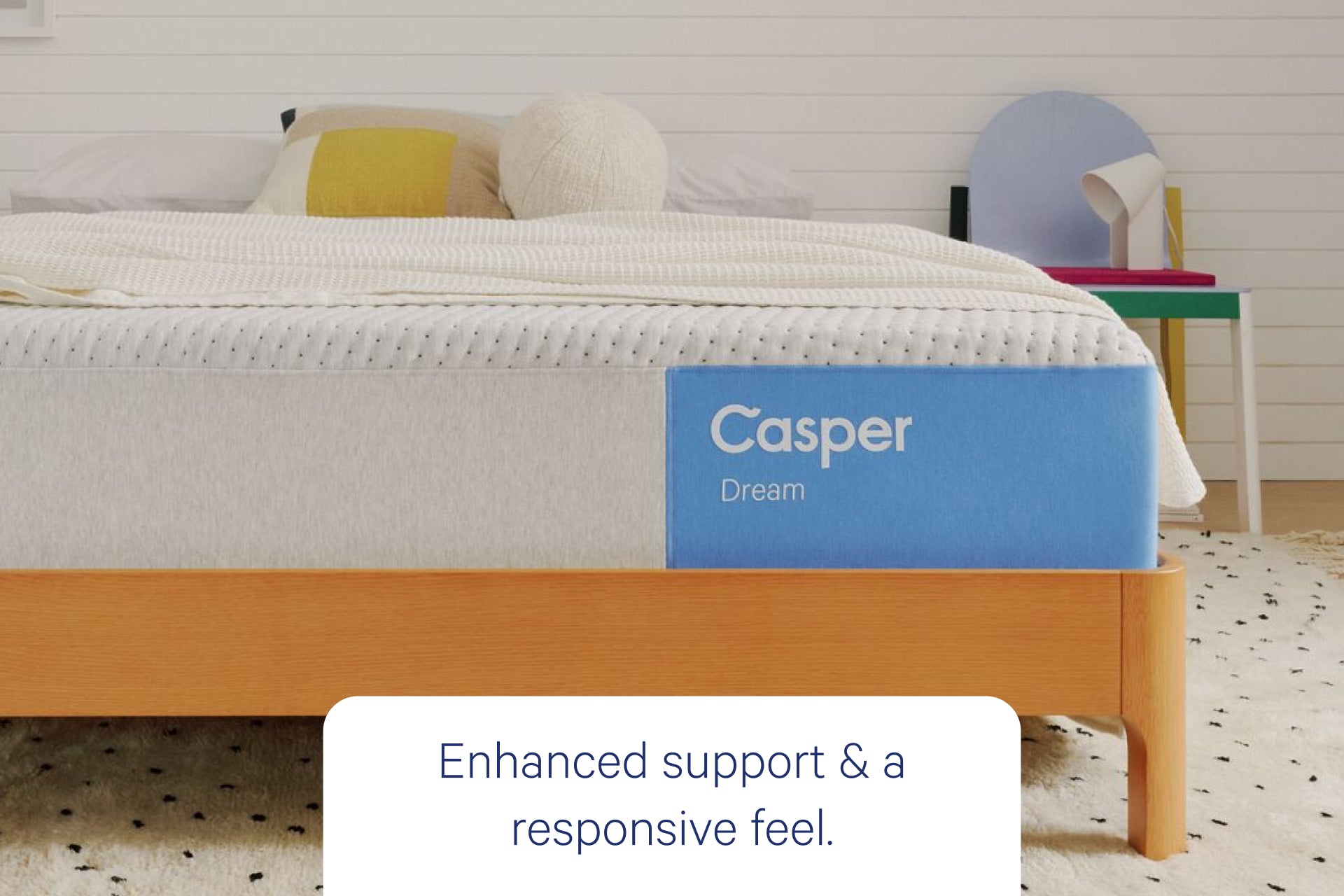 Front view of Casper's Dream mattress. Text at the bottom says 'Enhanced support & a responsive feel.'
