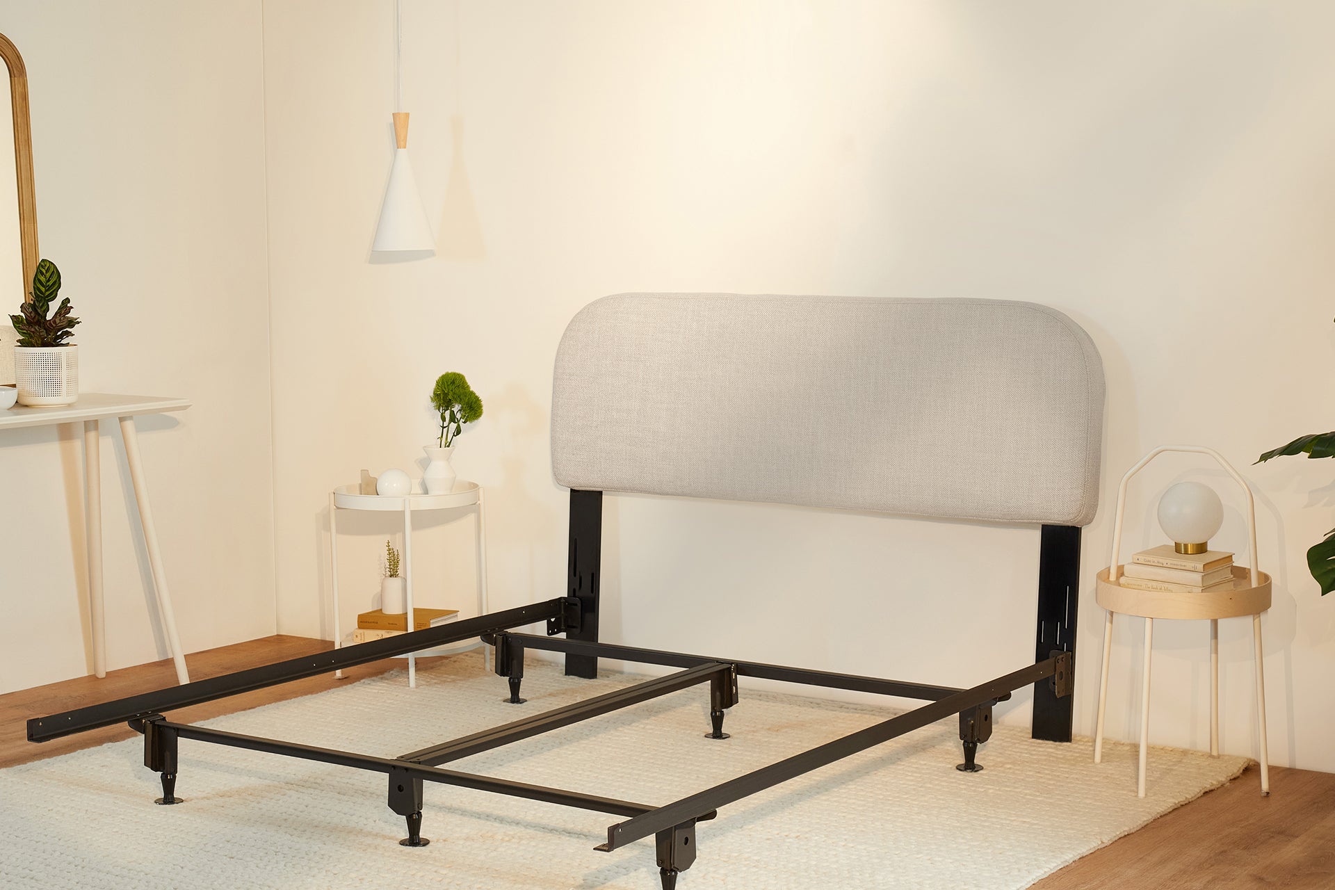Drift Attachable Headboard, fog color, attached to a metal bed frame.