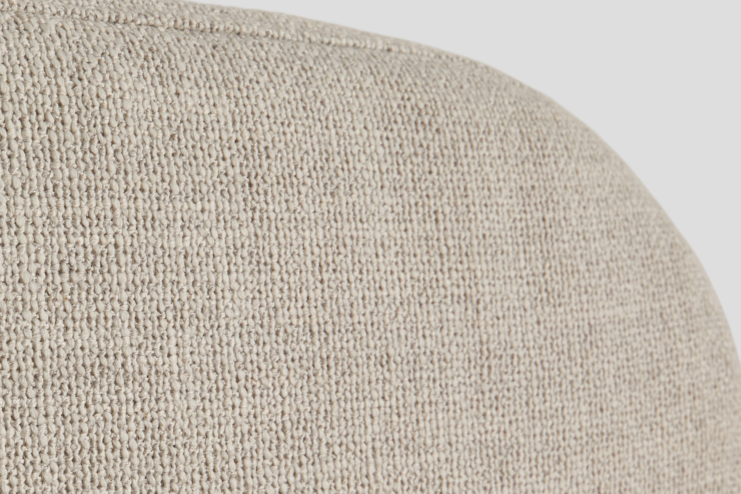 Close-up of the fog colored fabric of the Drift Attachable Headboard