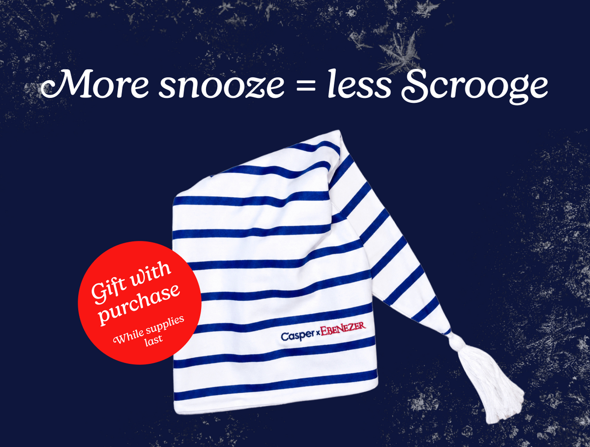 More snooze = less Scrooge. An image of a blue and white striped Ebenezer Hush Cap. Gift with purchase. While supplies last.