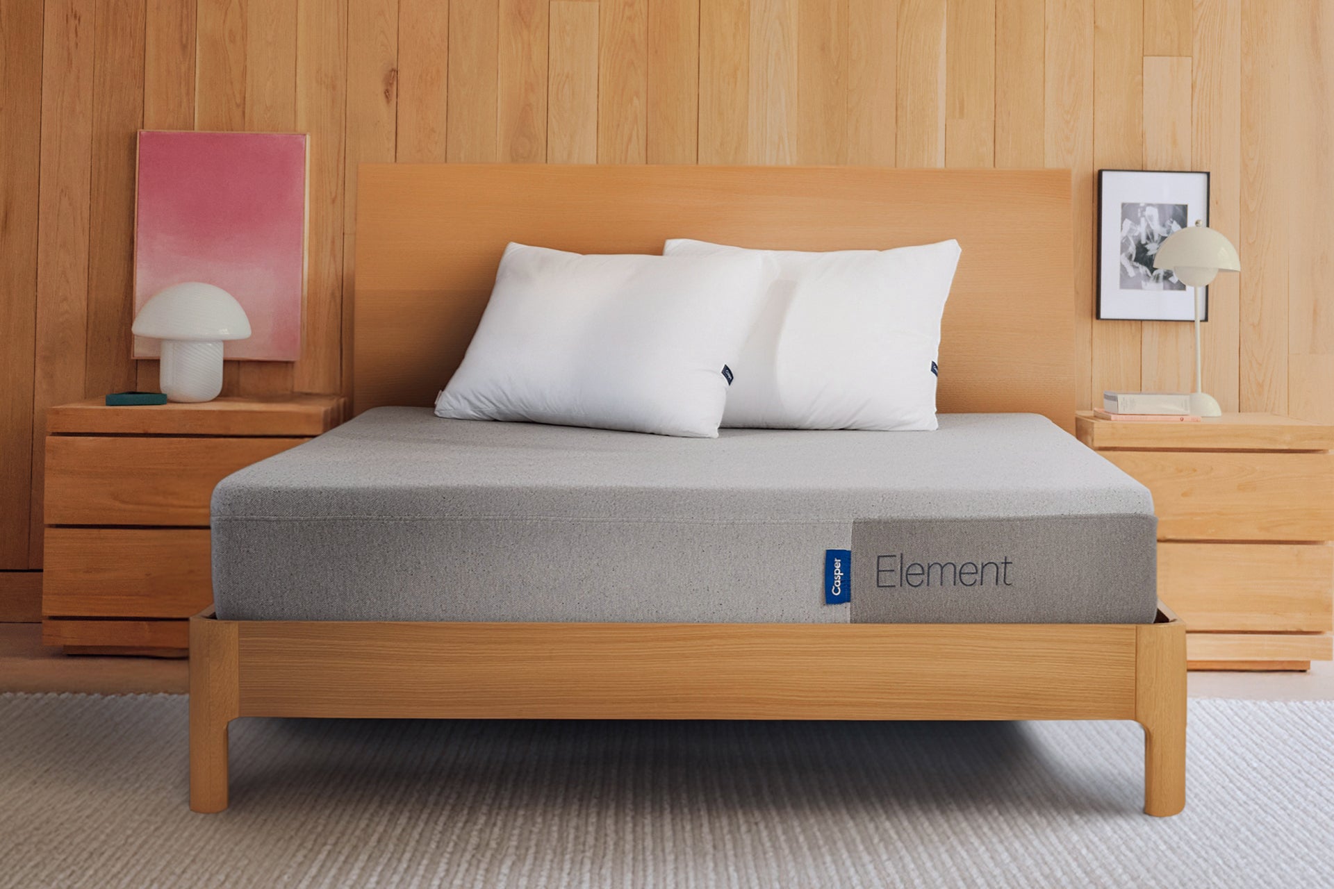 Casper's Element mattress on a wooden bed frame with a headboard
