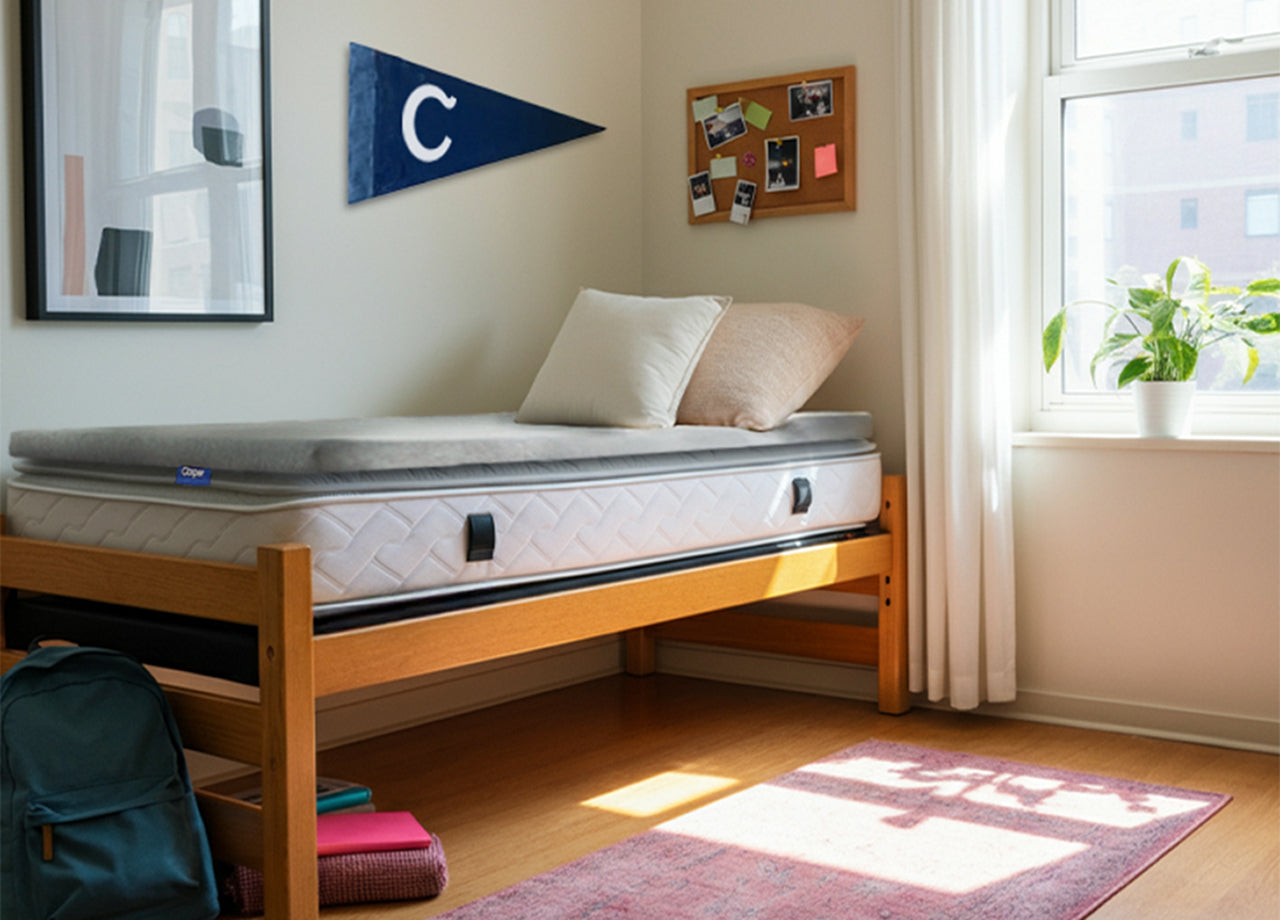 Casper's Essential Topper on a twin mattress in a dorm. Corner view.
