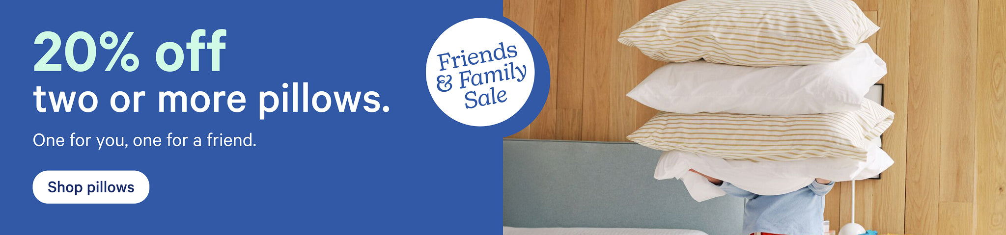A person stands next to a bed holding a stack of pillows, a mattress protector, and a sheet set. Text on the image reads "Friends and Family Sale. 30% off bundles. Save on everything you need for better sleep."