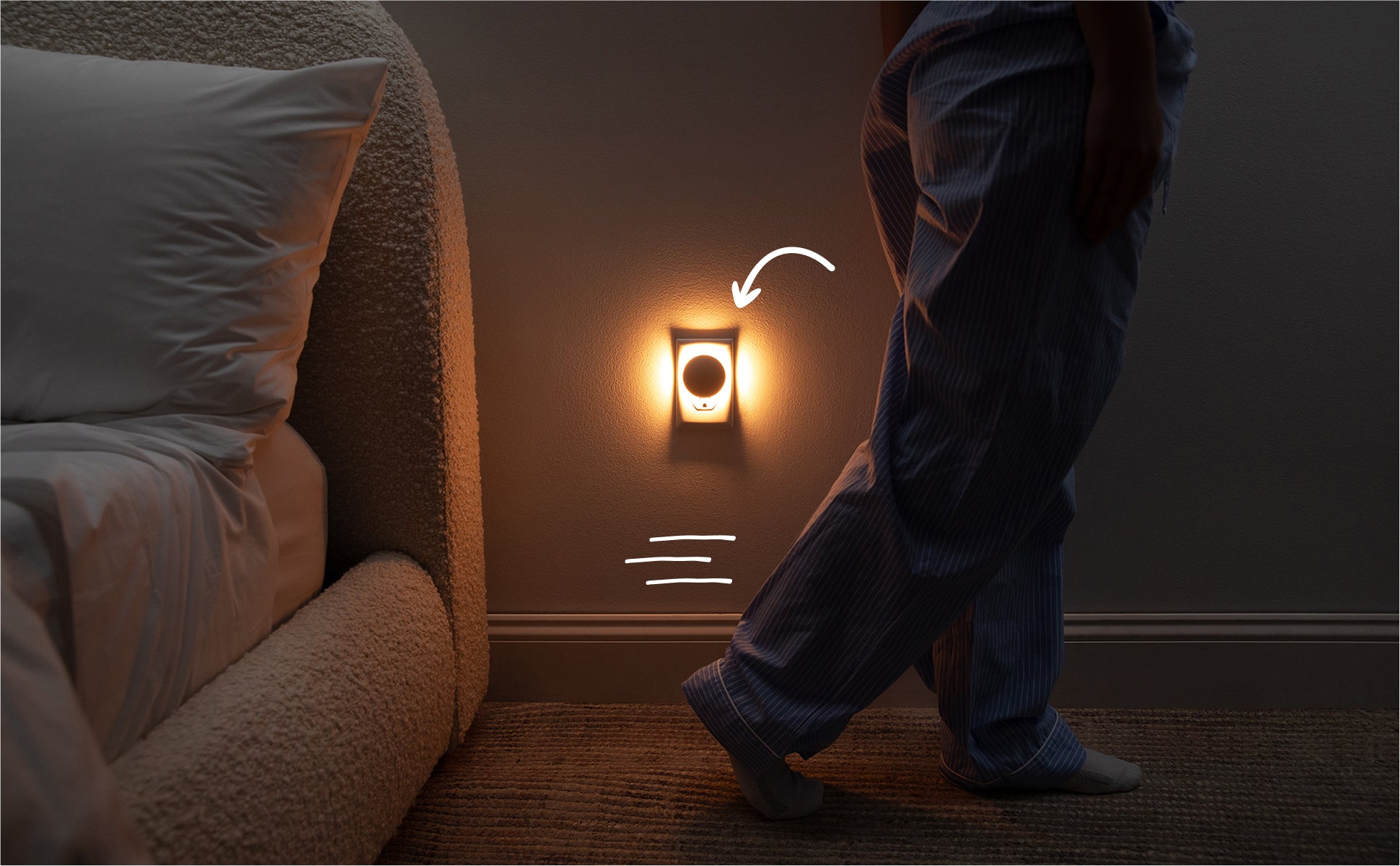 Image of a person walking by Glow Nightlight and activating the motion sensor to turn it on.