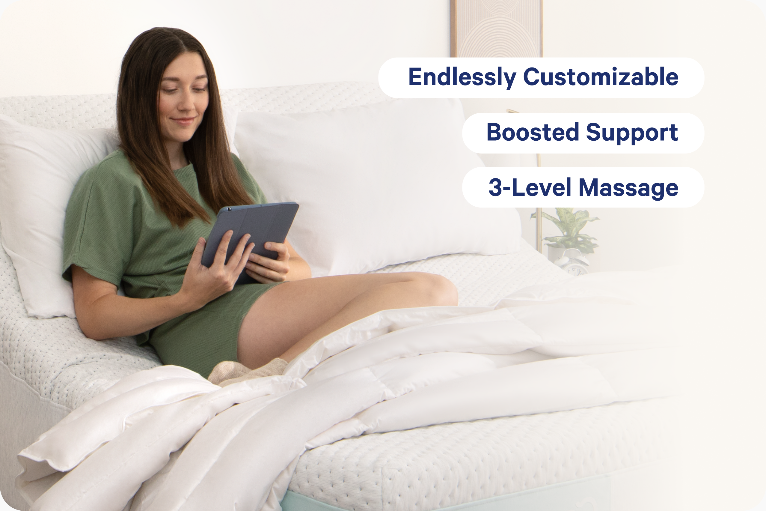 A woman in a green outfit sits in bed holding a tablet, with white bedding and pillows around her. Three text callouts on the right read "Endlessly Customizable," "Adjust Remotely," and "3-Level Massage," referring to the adjustable bed frame.
