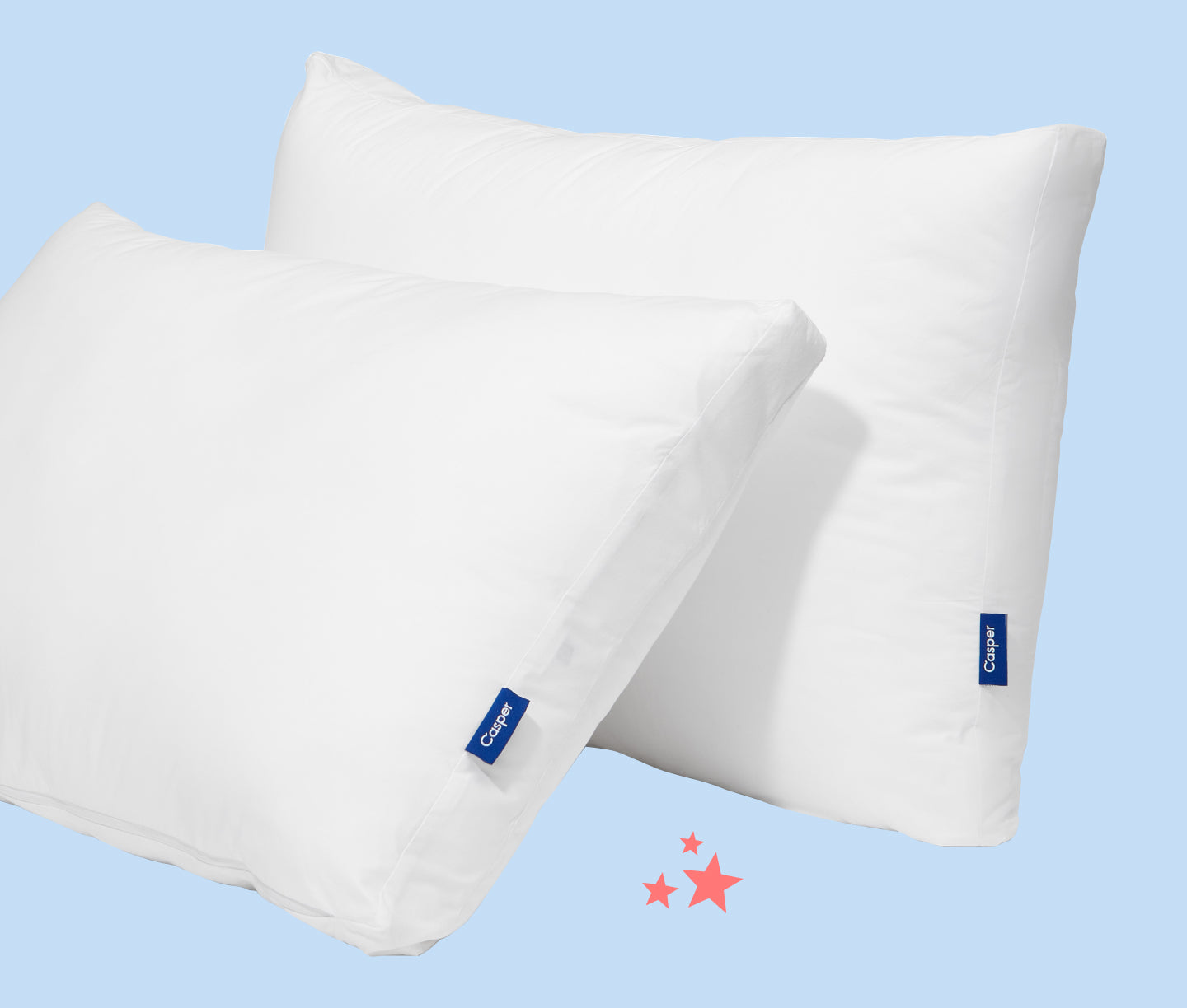Two Casper pillows against a light blue background