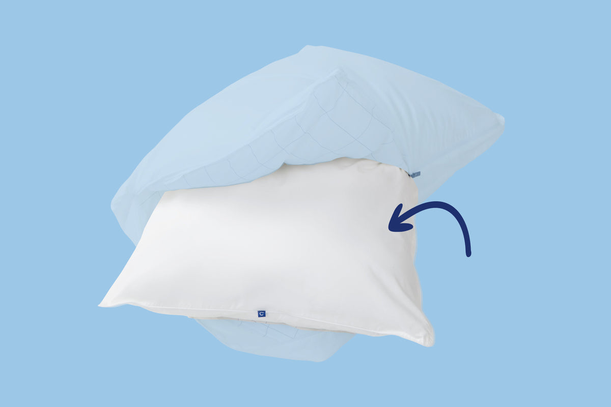 Original Pillow, unzipped, with the inner pillow sticking out from the outer pillow. Light blue background. An arrow points to the inner pillow.