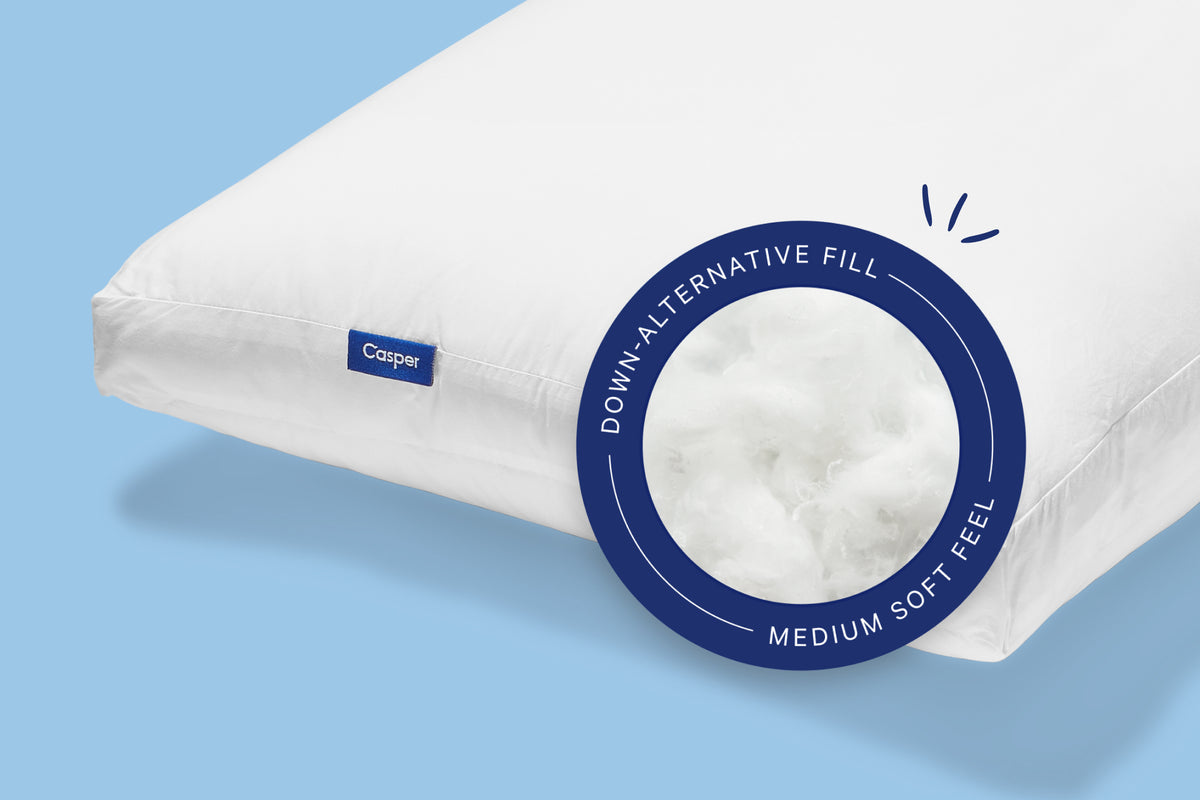 Casper's Original Pillow with a blue tag that indicates it has down-alternative fill and a medium-soft feel