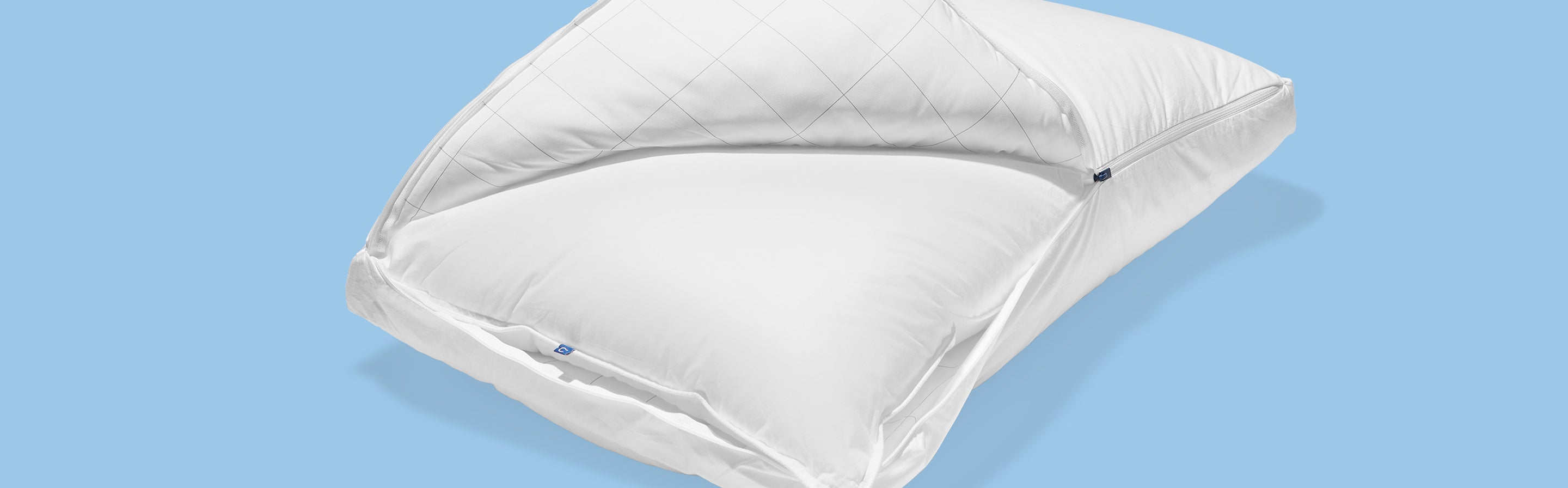 Casper's Original Pillow with its outer layer unzipped and flapped open