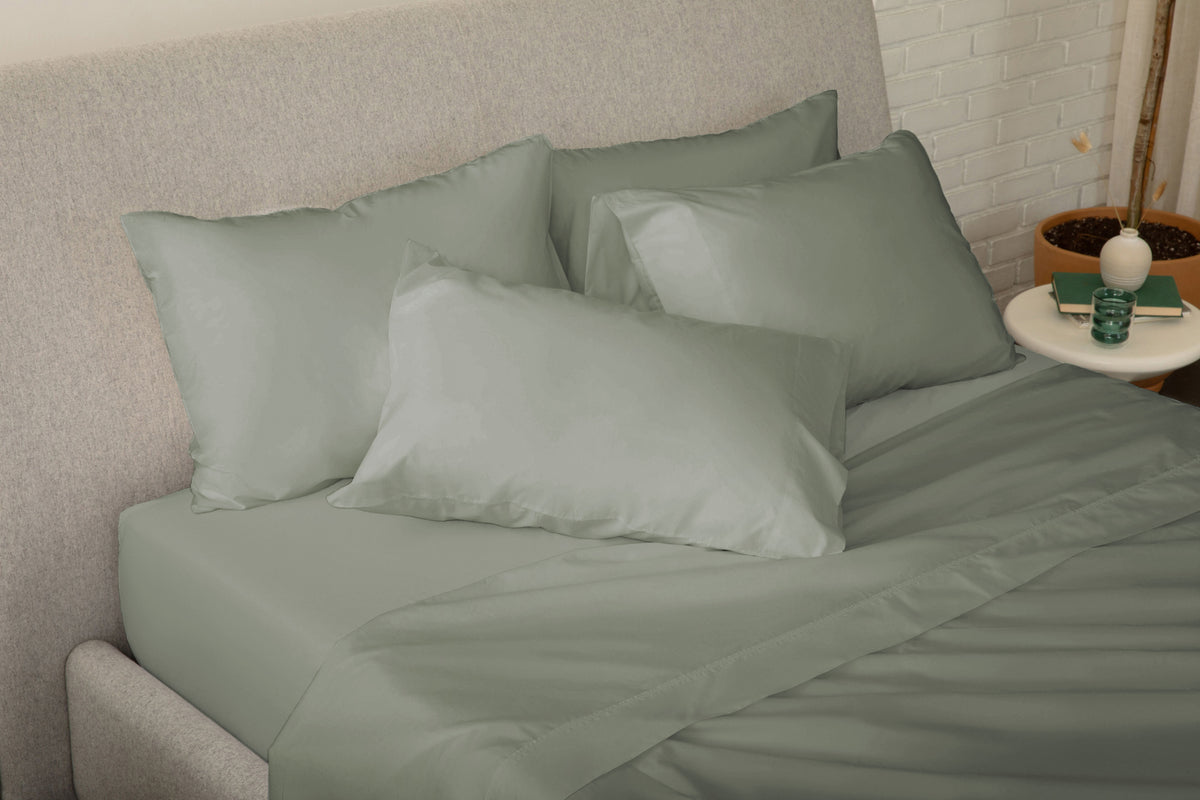 Fully dressed bed with eucalyptus-green Percale Sheet Set