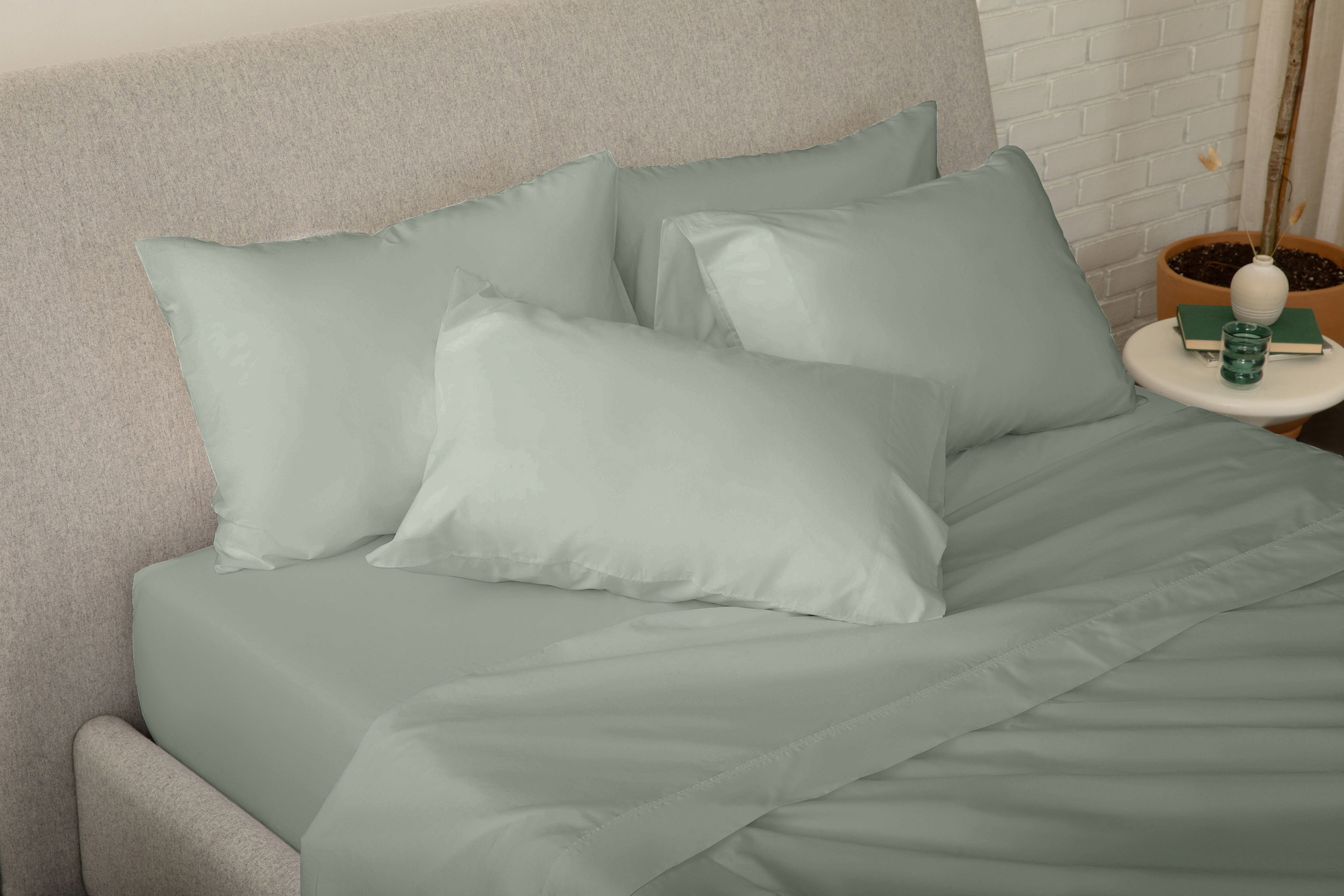 Fully dressed bed with eucalyptus green Percale Sheet Set