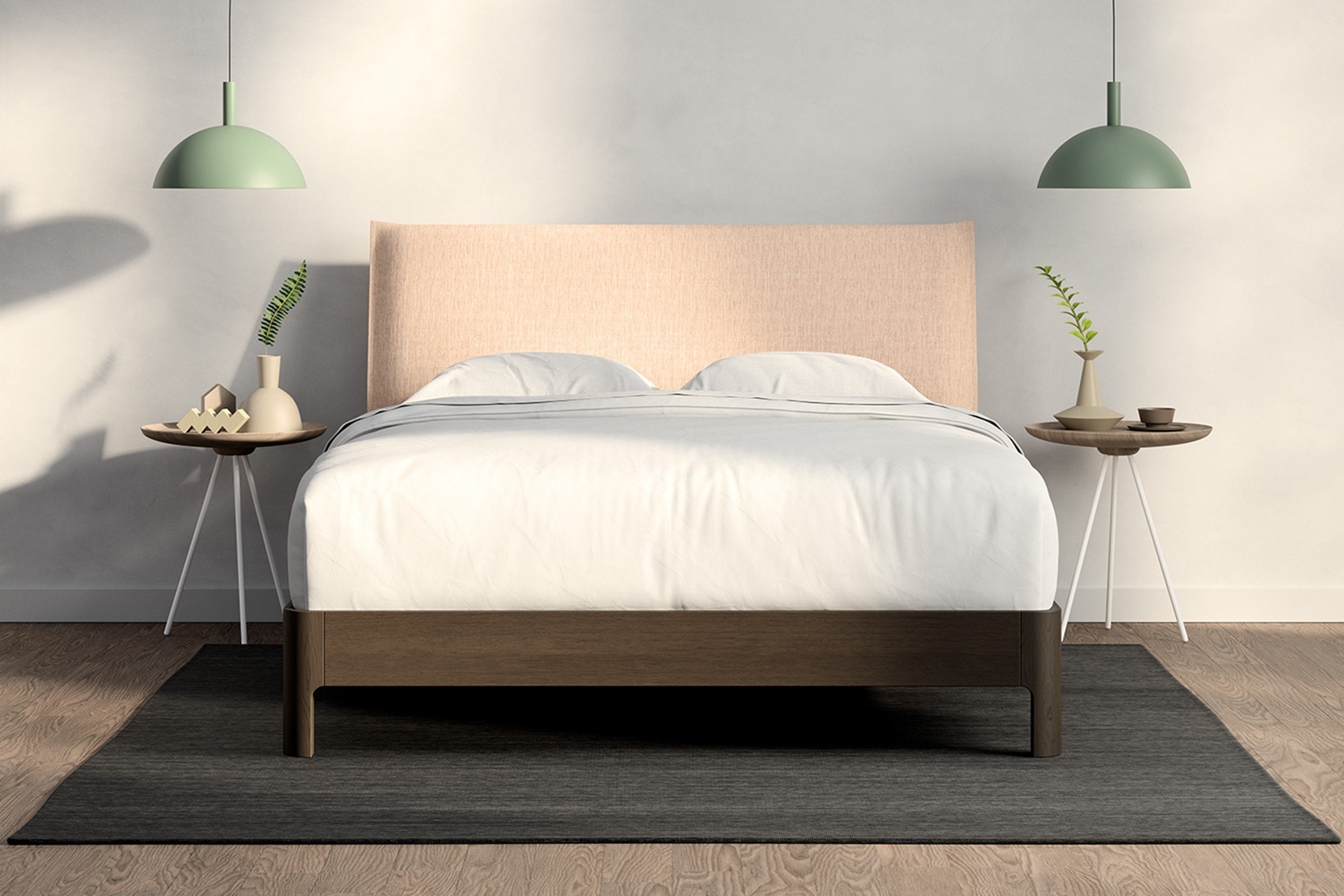 A fully made bed with a Repose Bed Frame. Front View.