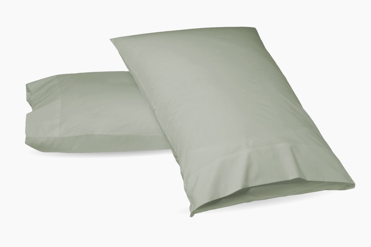 Two Eucalyptus green pillowcases shown on a plain white background