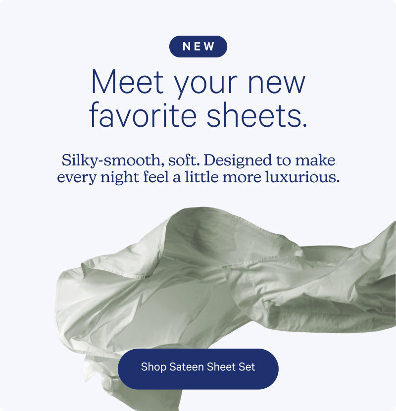 Promotional graphic for a sateen sheet set with the text 'Meet your new favorite sheets.' and 'Shop Sateen Sheet Set,' plus a draped pale sage sheet on a light gray background.