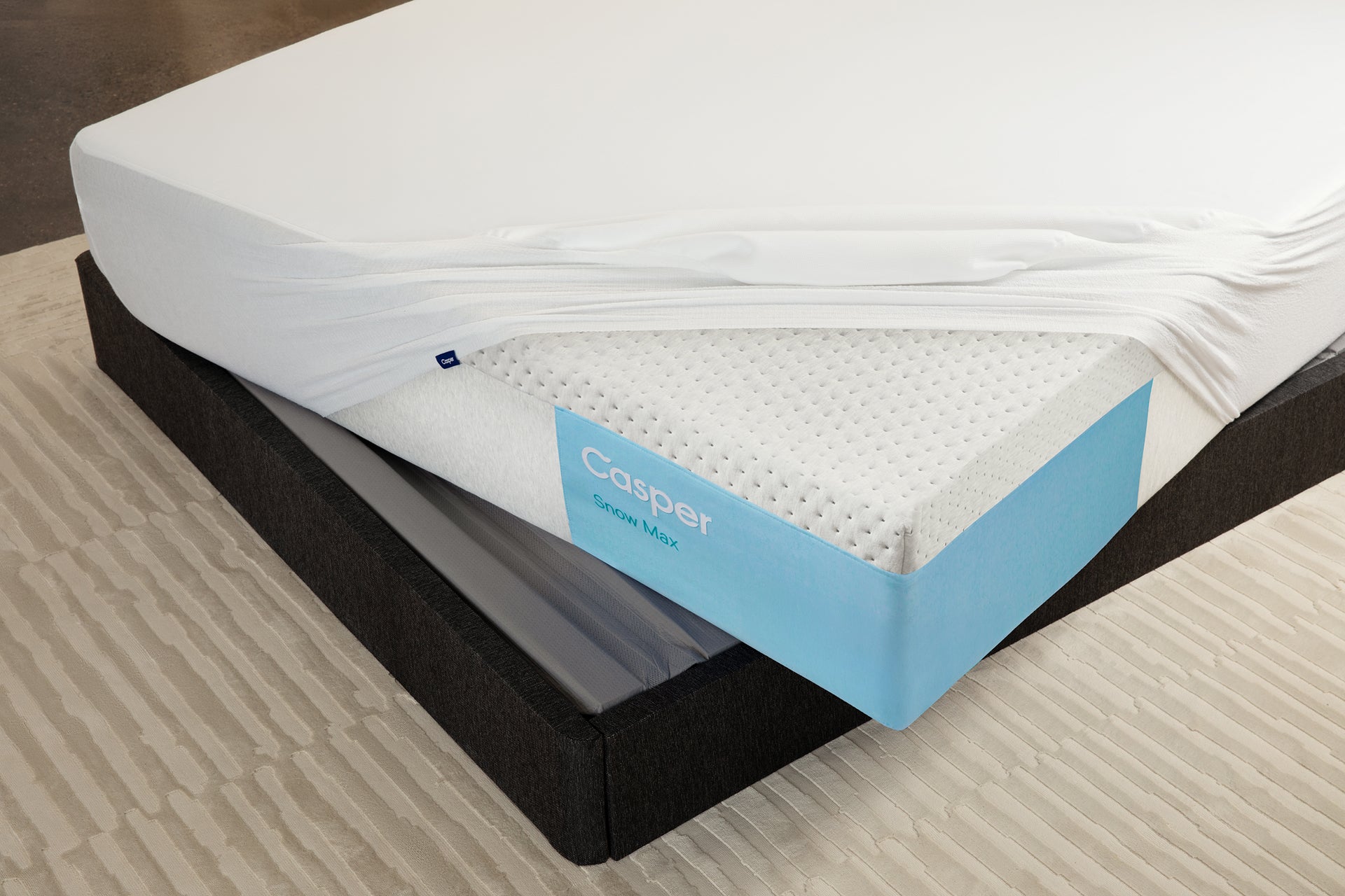 mattress protector on Casper's Snow Max mattress on a Foundation