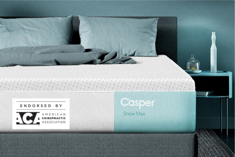 photo of a bed taken in front of the bed, focusing on the front-right corner