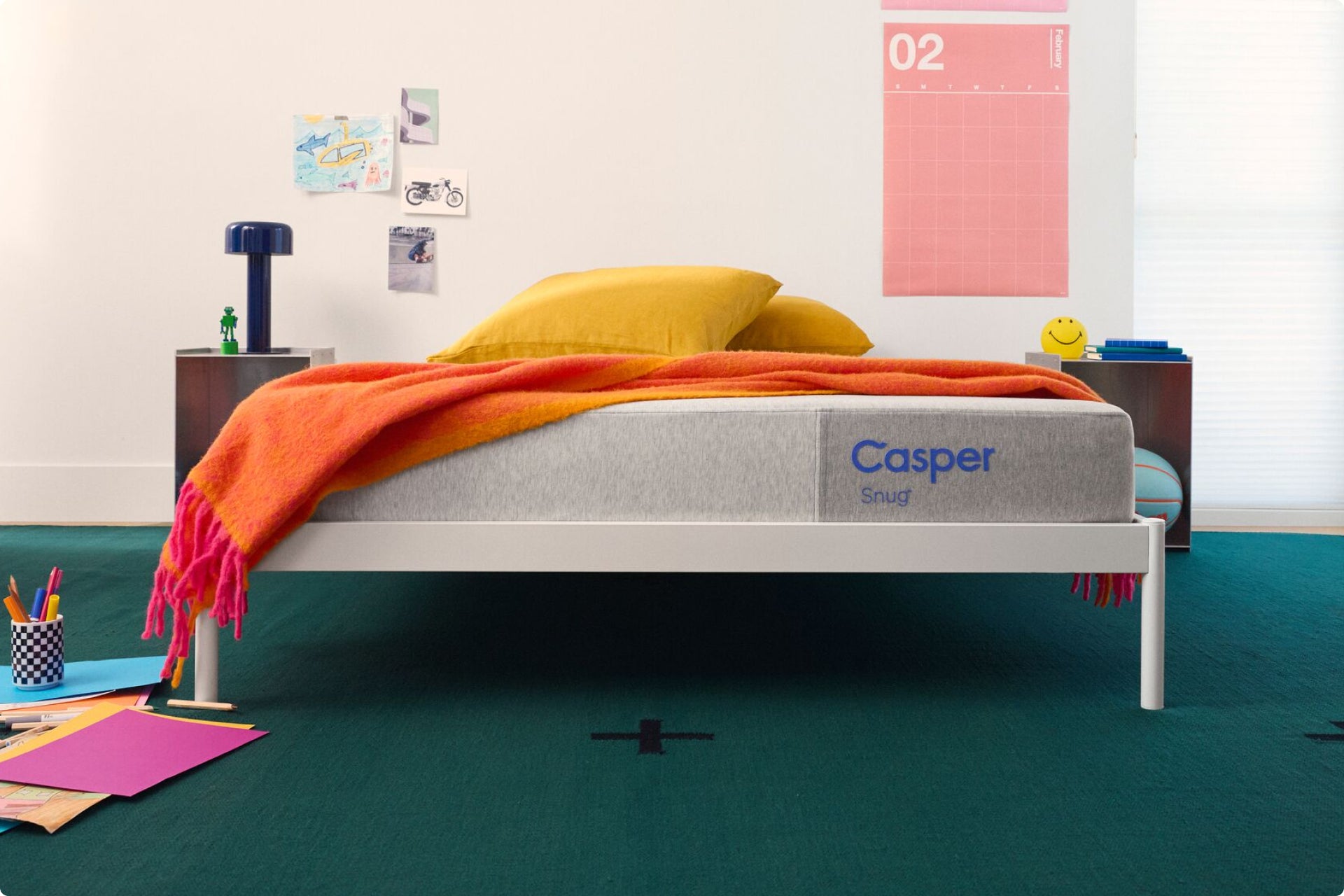 Front-facing view of the Casper Snug kids mattress in a bedroom setting.