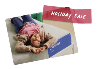 The One Casper mattress with a child lying on it and a 'Holiday Sale' banner above.